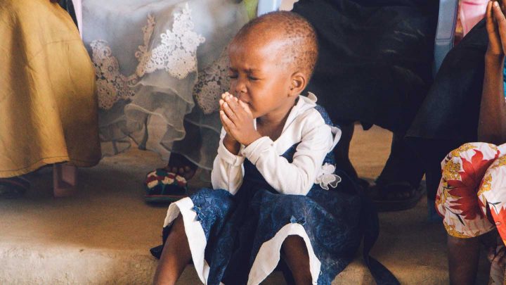 A child praying - Photo by Binti Malu from Pexels