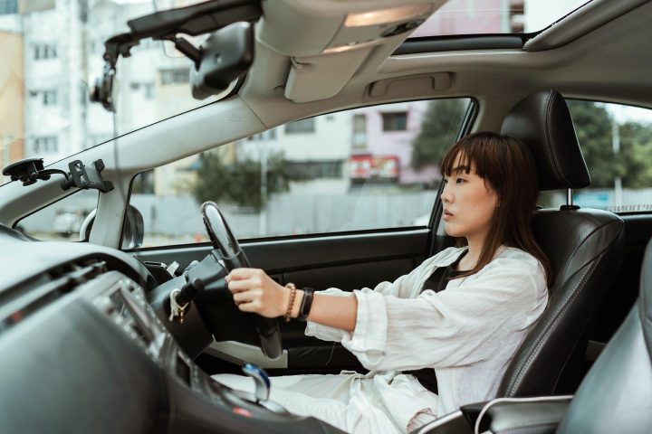 A woman driving in a car